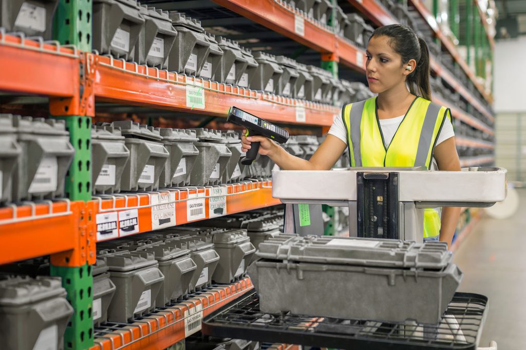 Warehouse worker scanning a product